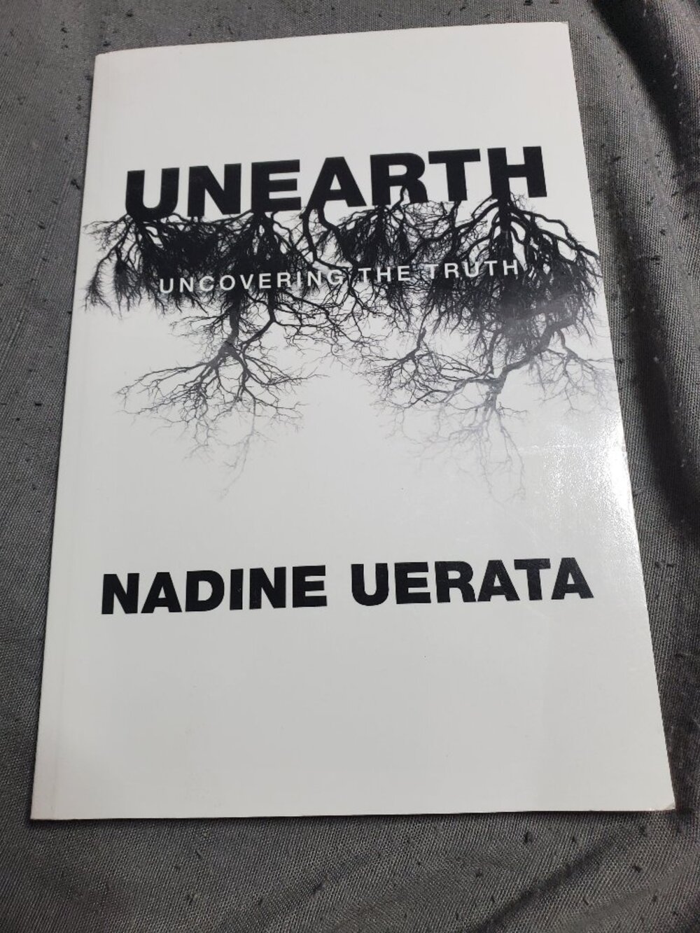 Unearth: Uncovering the Truth by Nadine Uerata Paperback